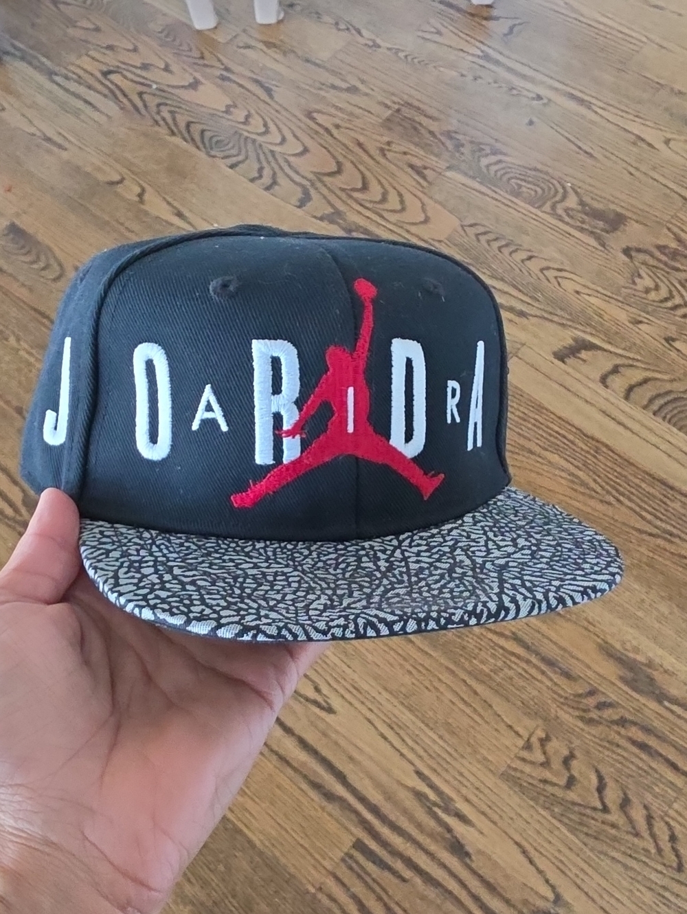 Jordan Kids Black Snapback with Red Jumpman and Grey Elephant Print Brim